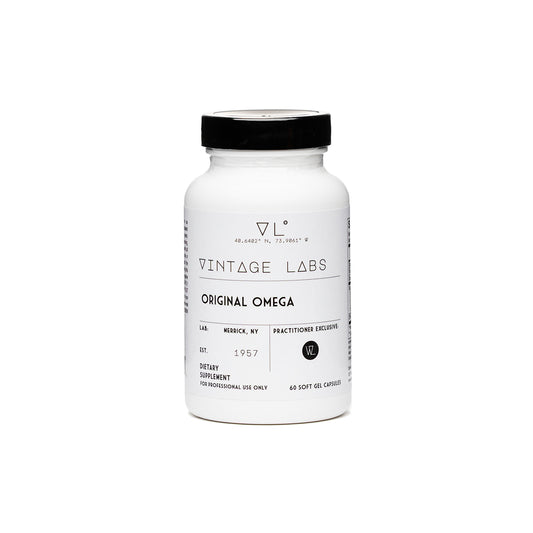 White supplement bottle with black cap labeled 'Vintage Labs' on a white background