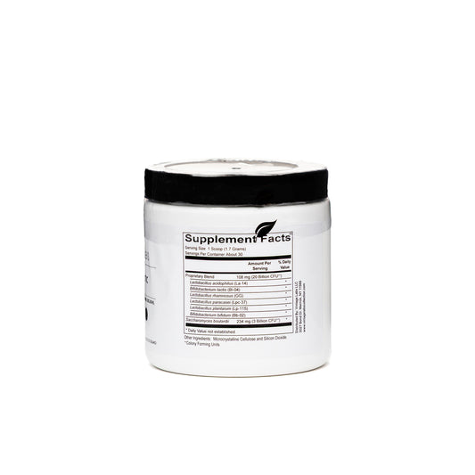 White supplement container with black lid on a white background