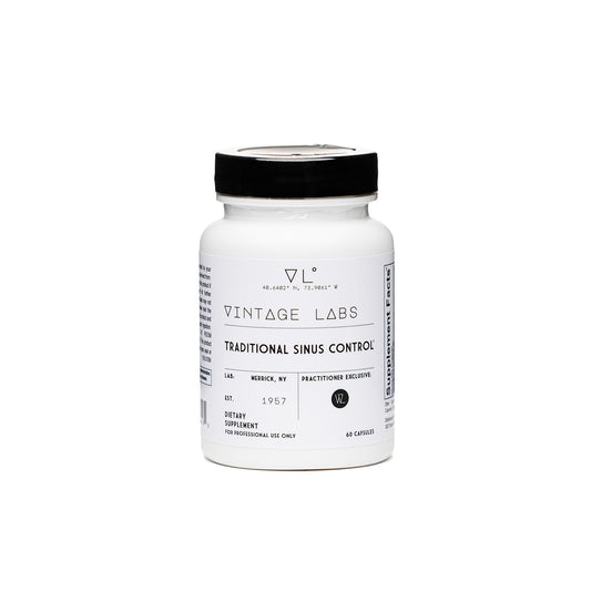 White supplement bottle with black cap labeled 'Vintage Labs' on a white background