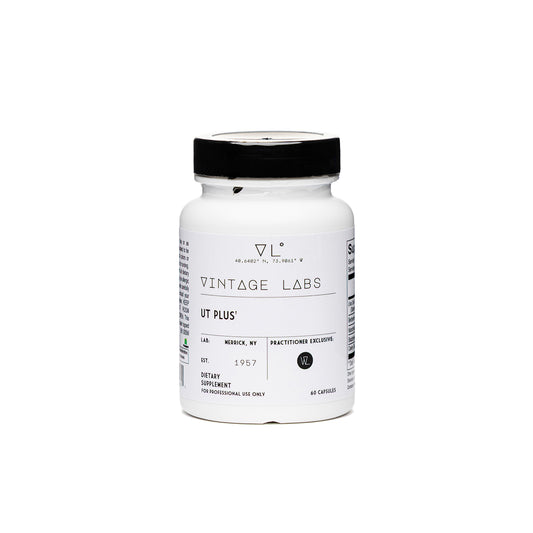White supplement bottle with black cap labeled 'Vintage Labs' on a white background