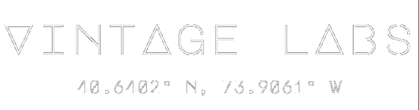 Vintage Labs logo with coordinates on a white background