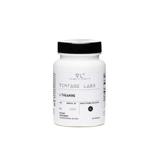 White supplement bottle with black cap labeled 'Vintage Labs' on a white background