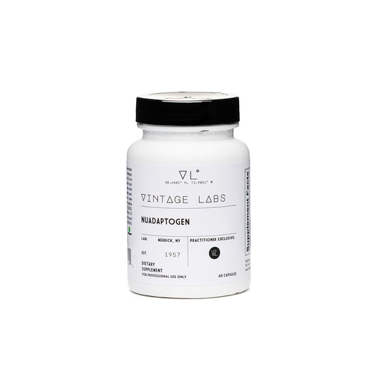 White supplement bottle with black cap labeled 'Vintage Labs' on a white background