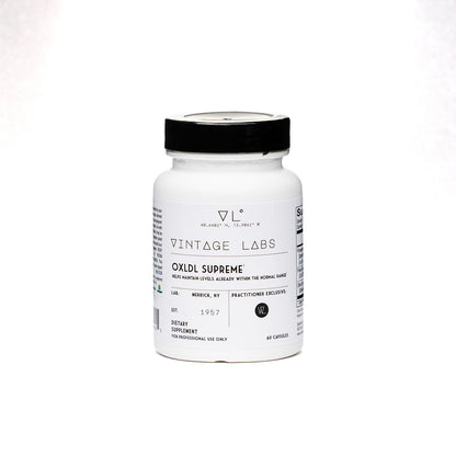 White supplement bottle with black cap labeled 'Vintage Labs' on a white background