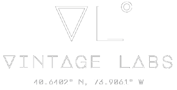 Logo of Vintage Labs with coordinates below on a white background